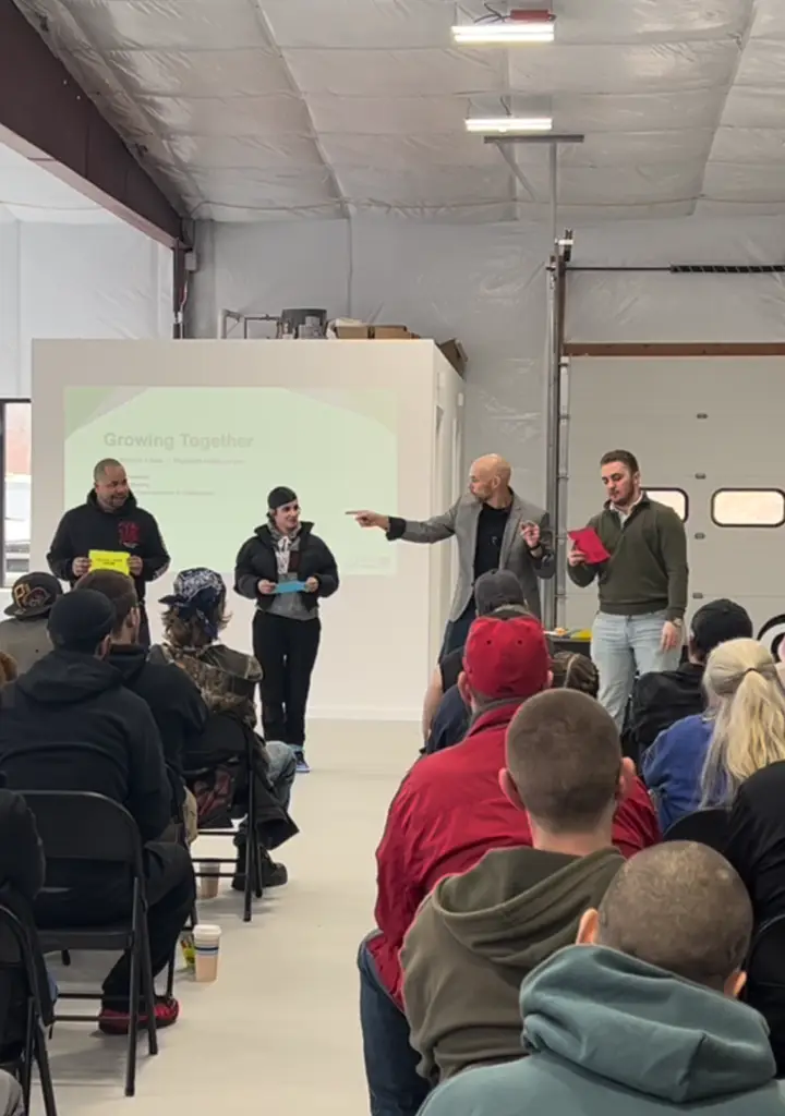 Robert Hackenson Jr. speaking at Greene Rubber Company about manufacturing change management