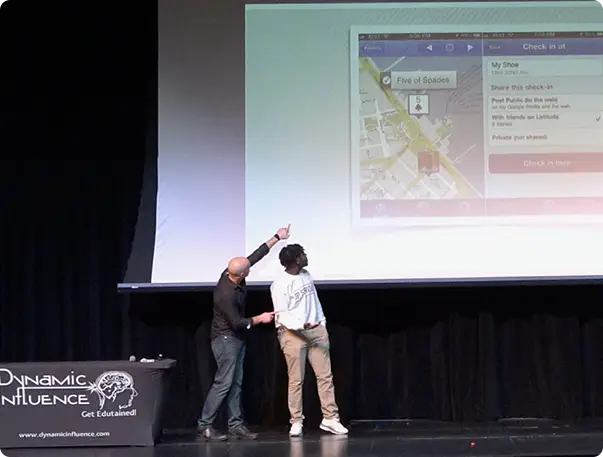 Speaker presenting a social media safety assembly across multiple middle school grades